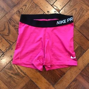 Hot pink Nike Pros